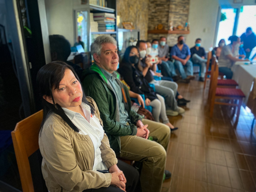 Tula Salud’s executive director Isabel Lobos, left, and Christy Gombay, TulaSalud president, listen at a meeting in Cobán, the capital of Alta Verapaz department. Photo by Kristina Blanchflower