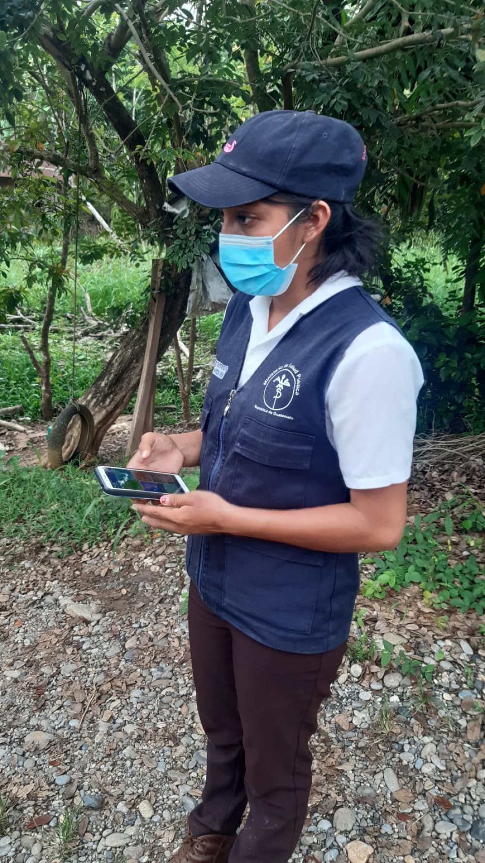 A frontline health worker uses Tula's community eHealth system to enter COVID-19 health data.